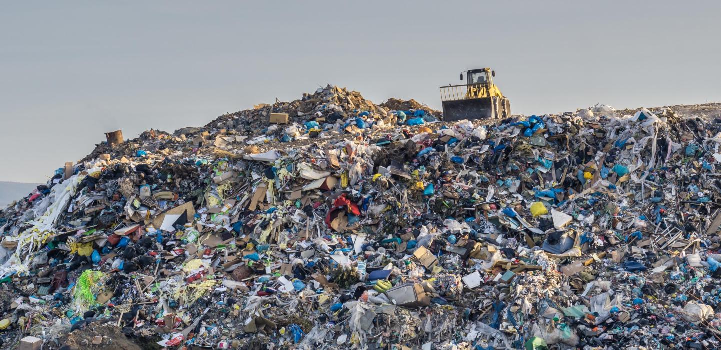 Image of tractor on landfill