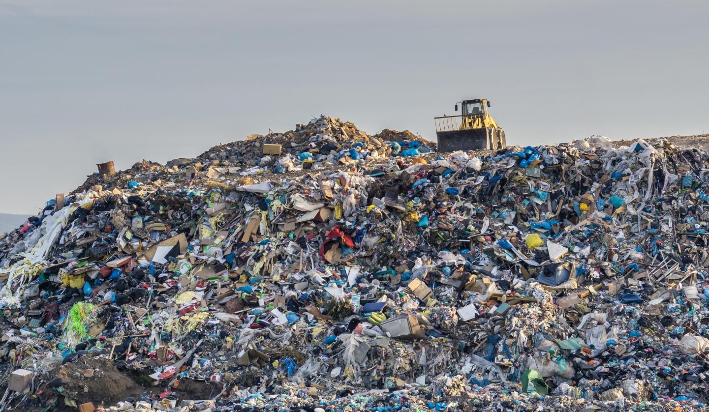 Image of tractor on landfill