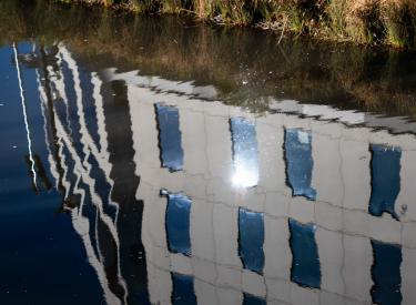 Image of reflection of building in water