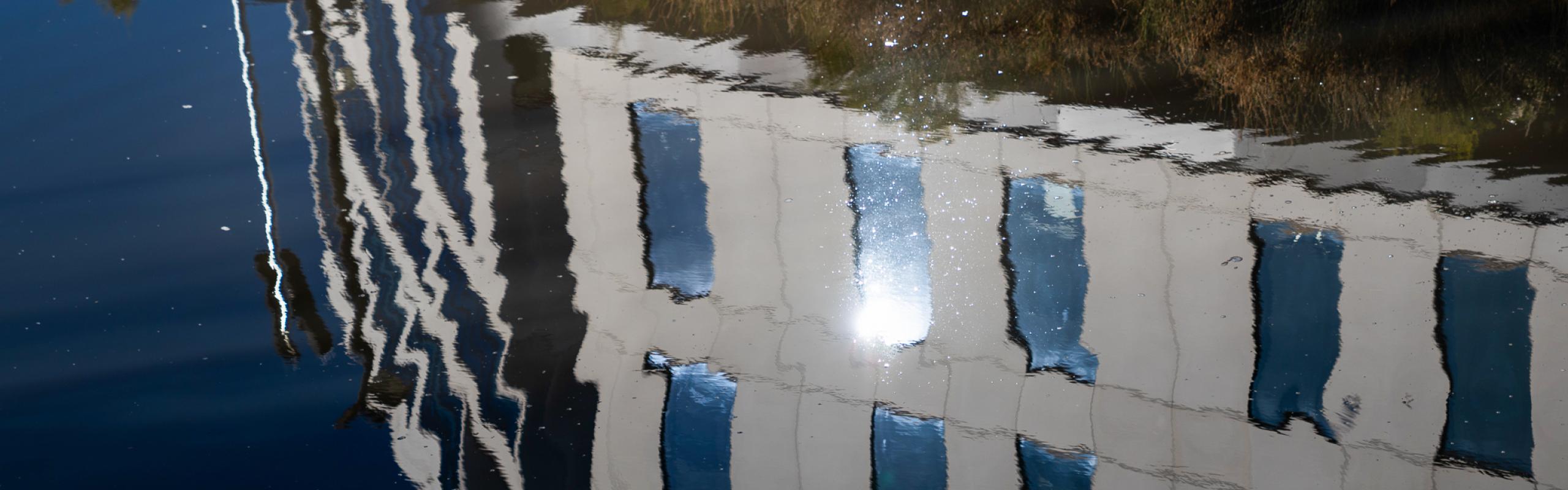 Image of reflection of building in water