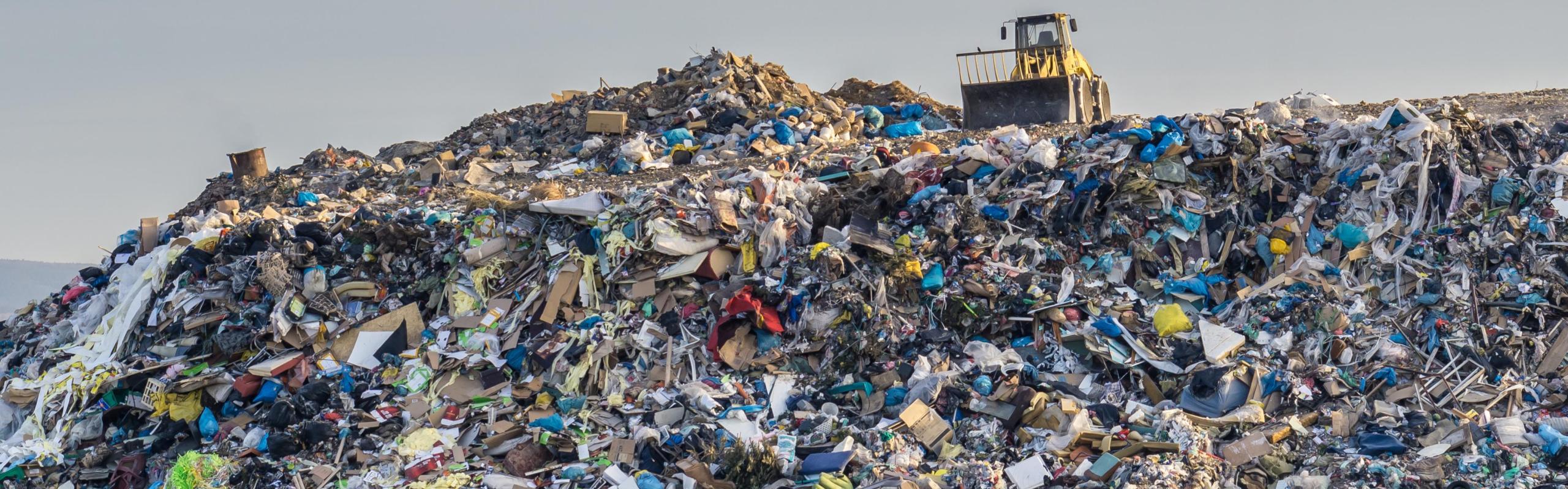 Image of tractor on landfill